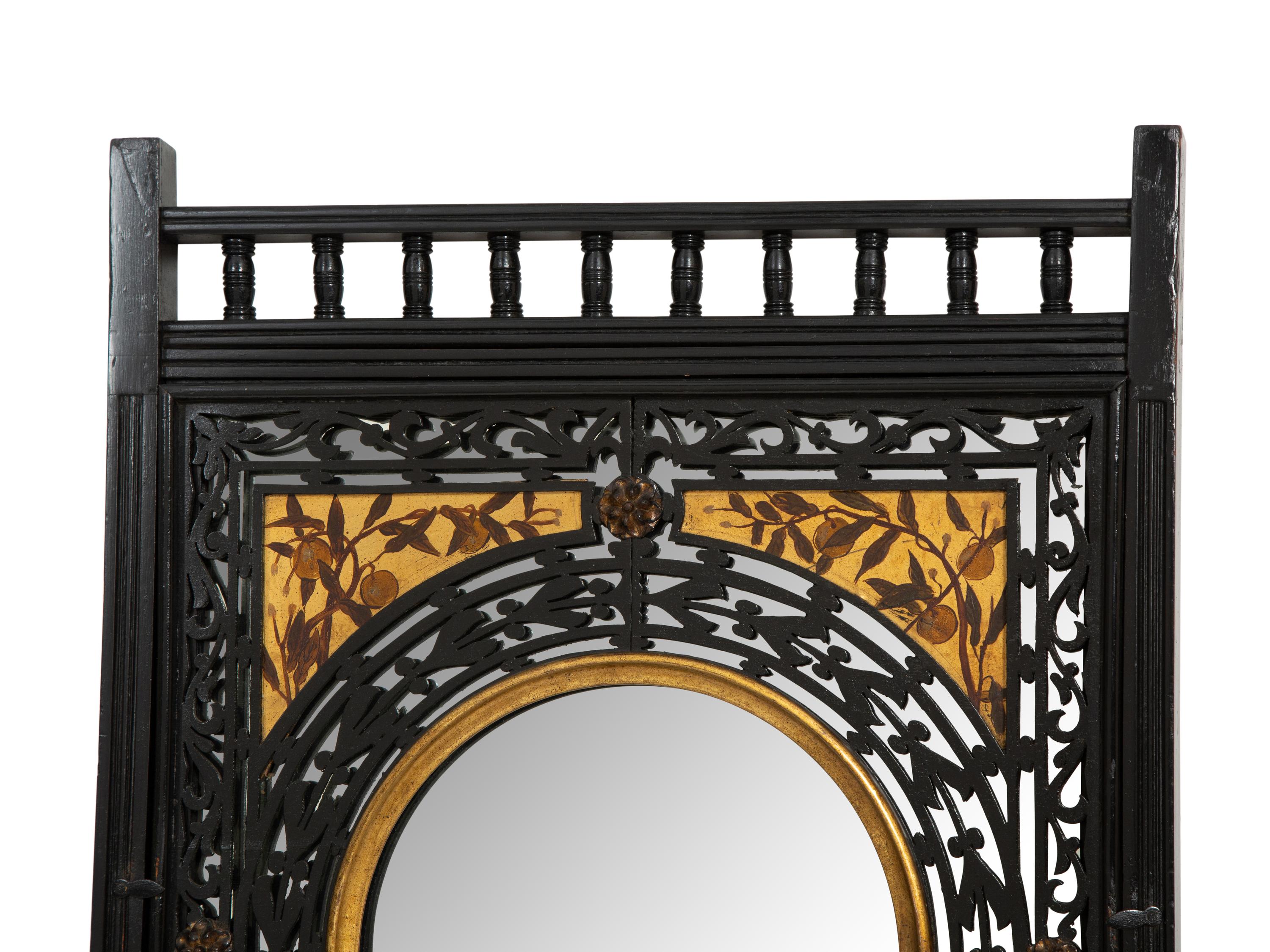 A Pair of Victorian Aesthetic Movement Ebonized, Painted and Parcel Gilt Mirrored Wall Brackets
