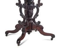 A Victorian Rococo Revival Rosewood Marble-Top Table