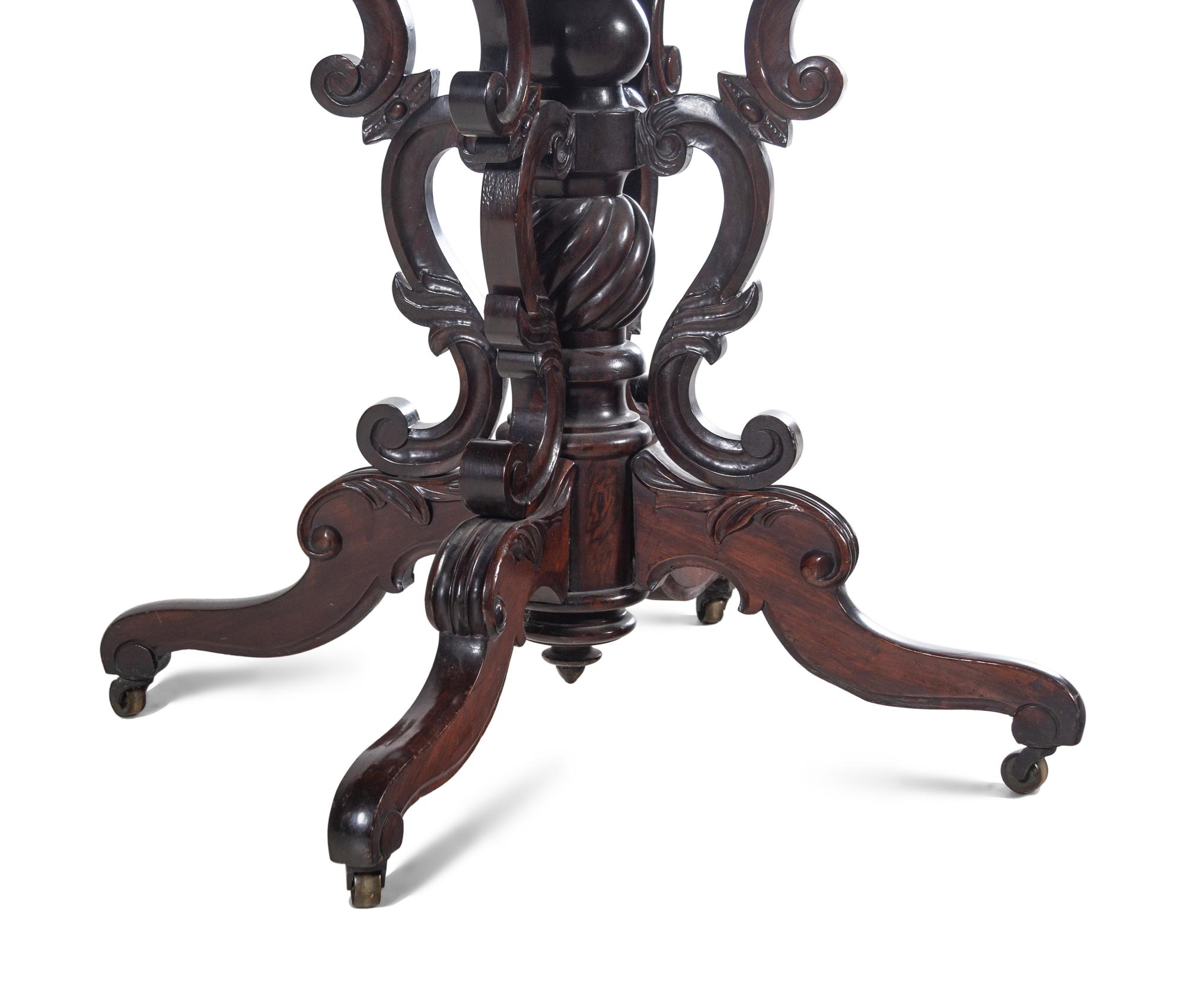 A Victorian Rococo Revival Rosewood Marble-Top Table