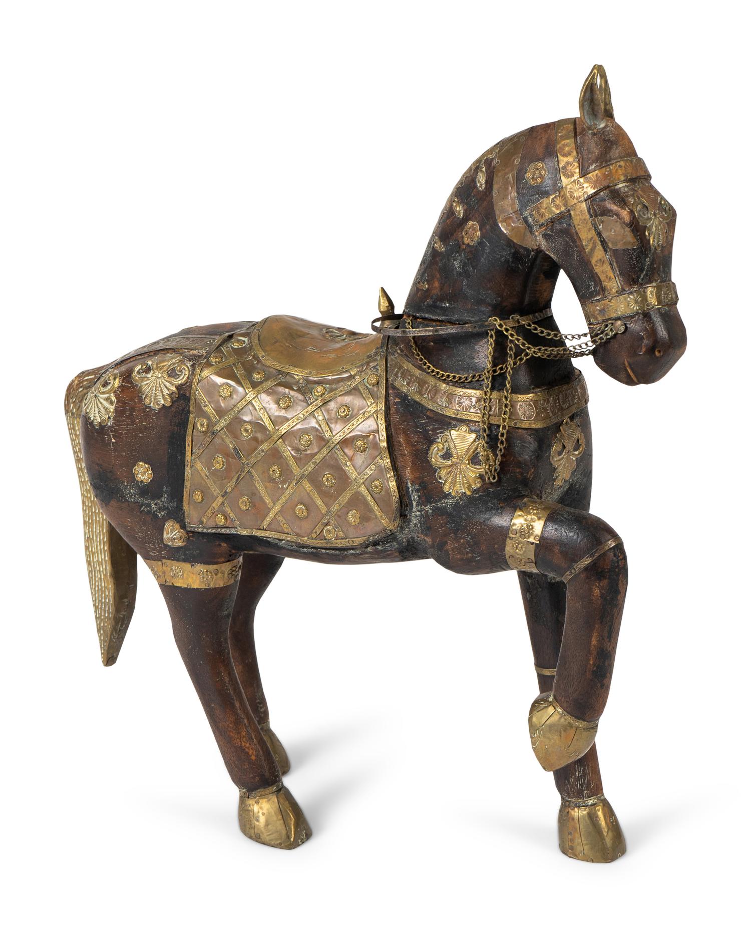 A Moroccan Carved Wood and Brass Horse — 20TH CENTURY