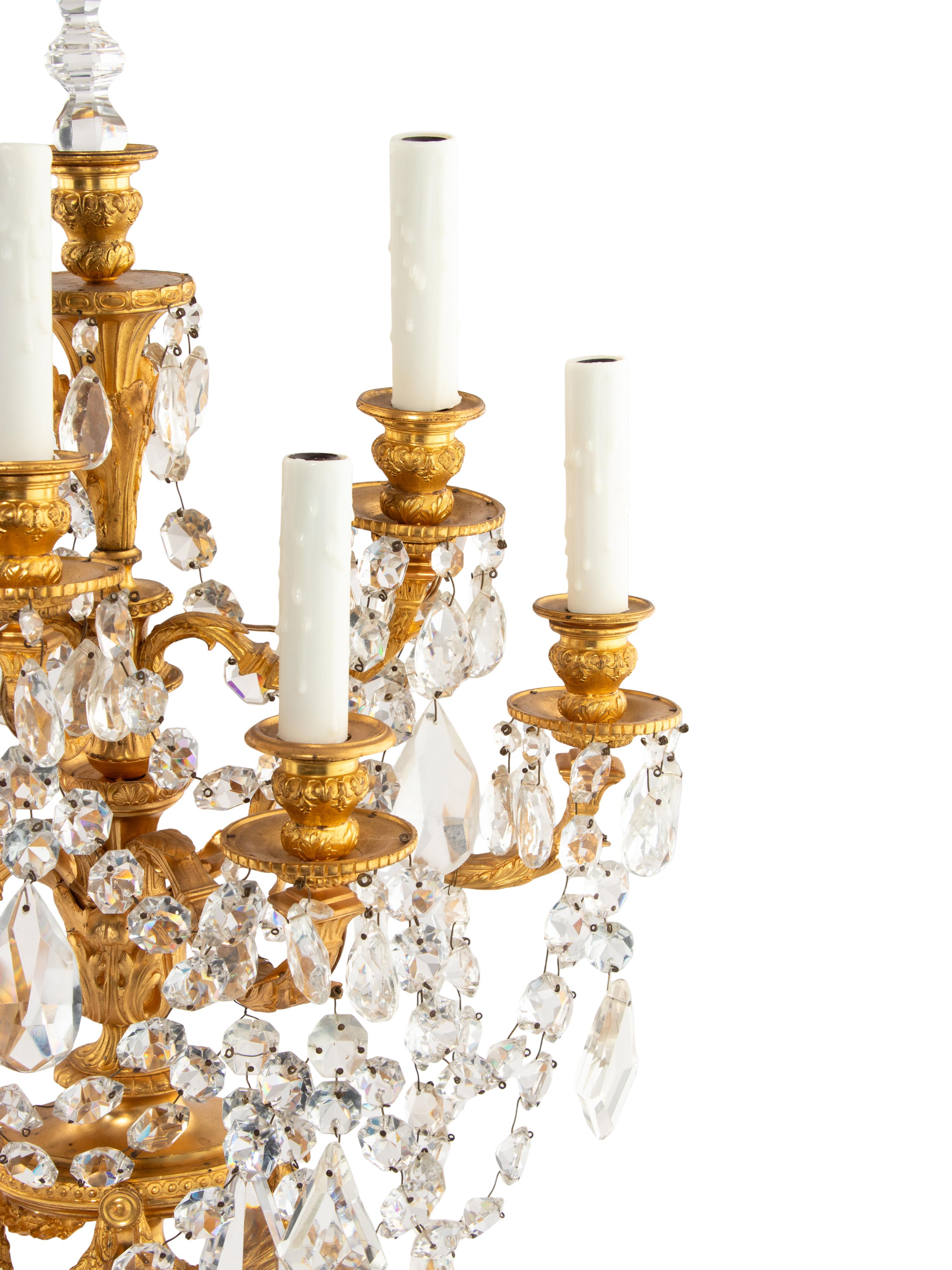 A Pair of French Gilt Bronze and Cut Glass Seven-Light Candelabra