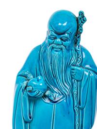 Two Turquoise Glazed Porcelain Figures of Immortals