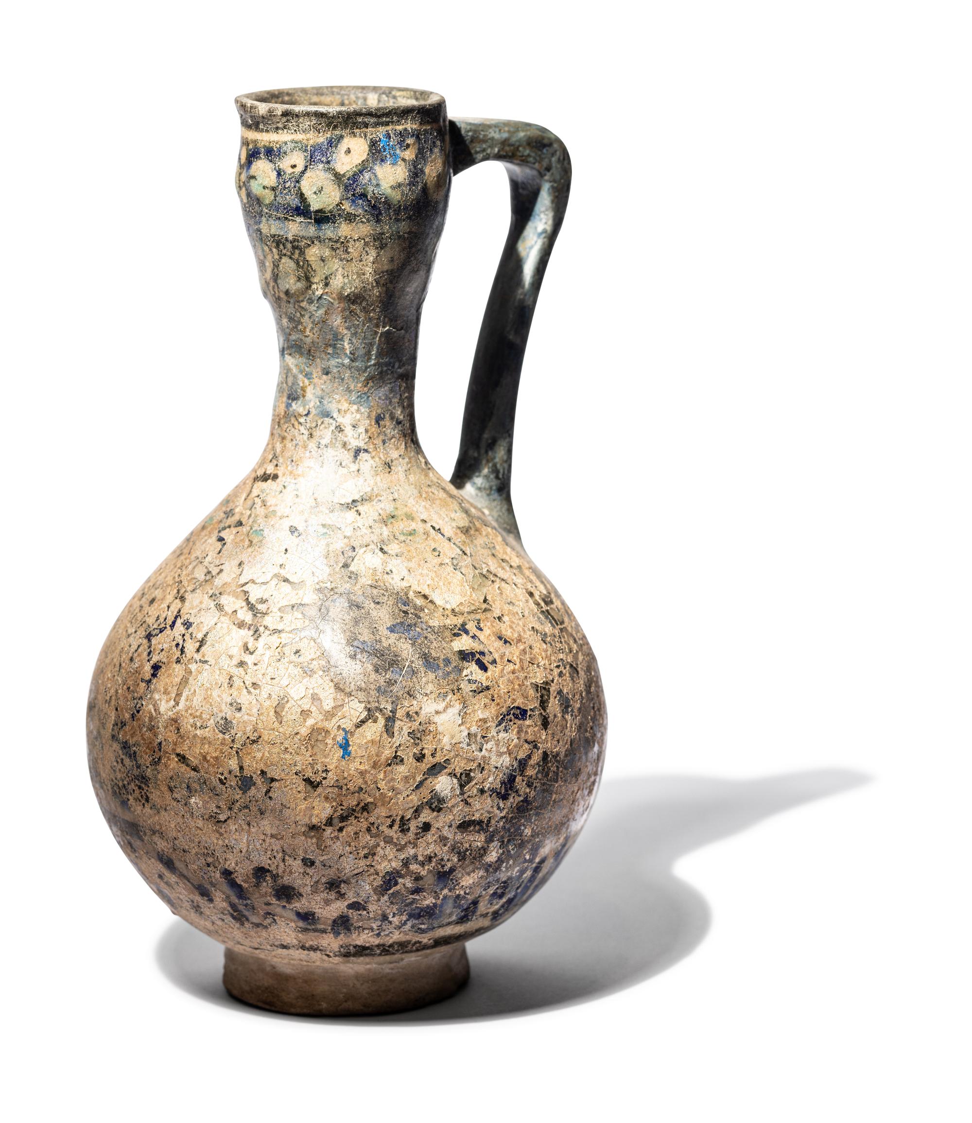 A Ilkhanid Clear-Glazed Ewer