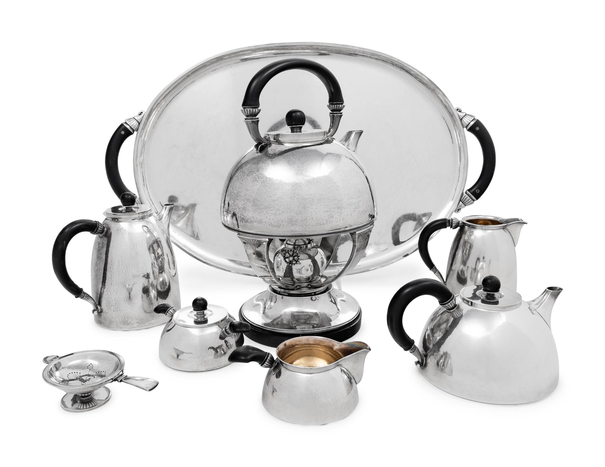 A Gundorph Albertus Designed Georg Jensen Silver Eight-Piece Tea and Coffee Service
