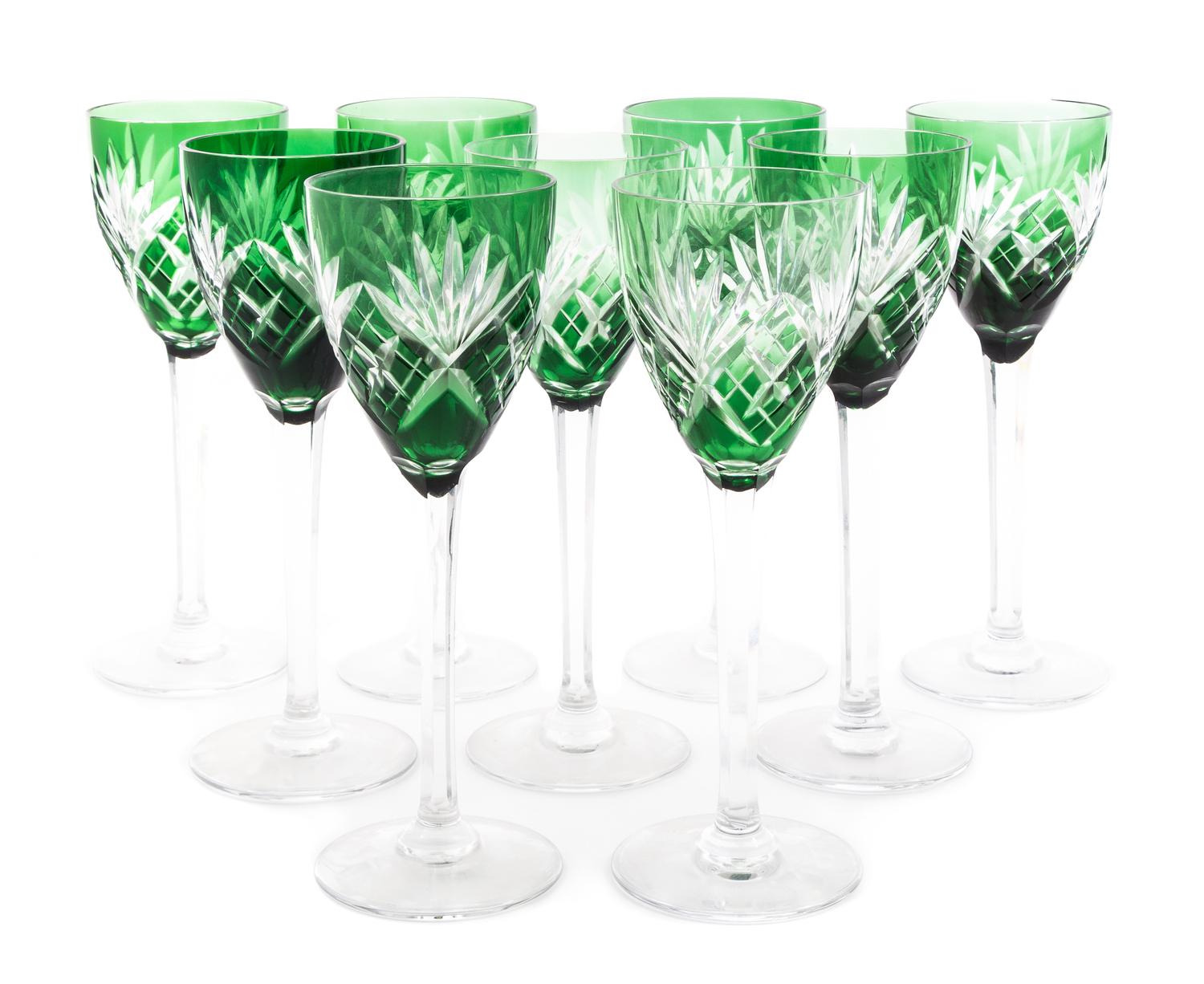 A Set of Nine Green Cut to Clear Glass Wine Stems Height 8 1/2 inches.