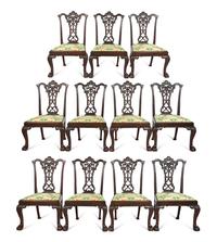 A Set of Eleven George III Style Ribbon-Carved Mahogany Dining Chairs