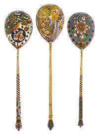 A Group of Three Russian Silver-Gilt and Enamel Spoons, Mark of 11th Artel, Moscow, early 20th century, each having an enameled finial,