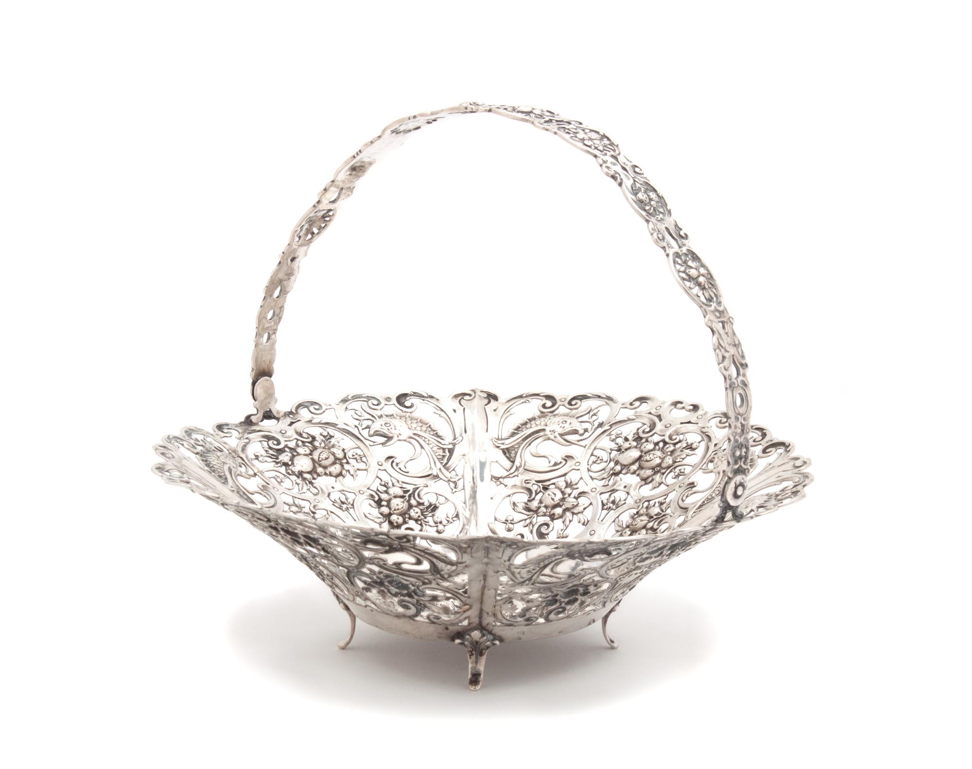 A German Silver Reticulated Basket with Swing Handle Diameter 9 1/2 inches. — 20TH CENTURY