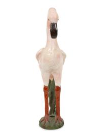 A Tole Peint Model of Two Flamingos and a Glazed Earthenware Model of a Flamingo