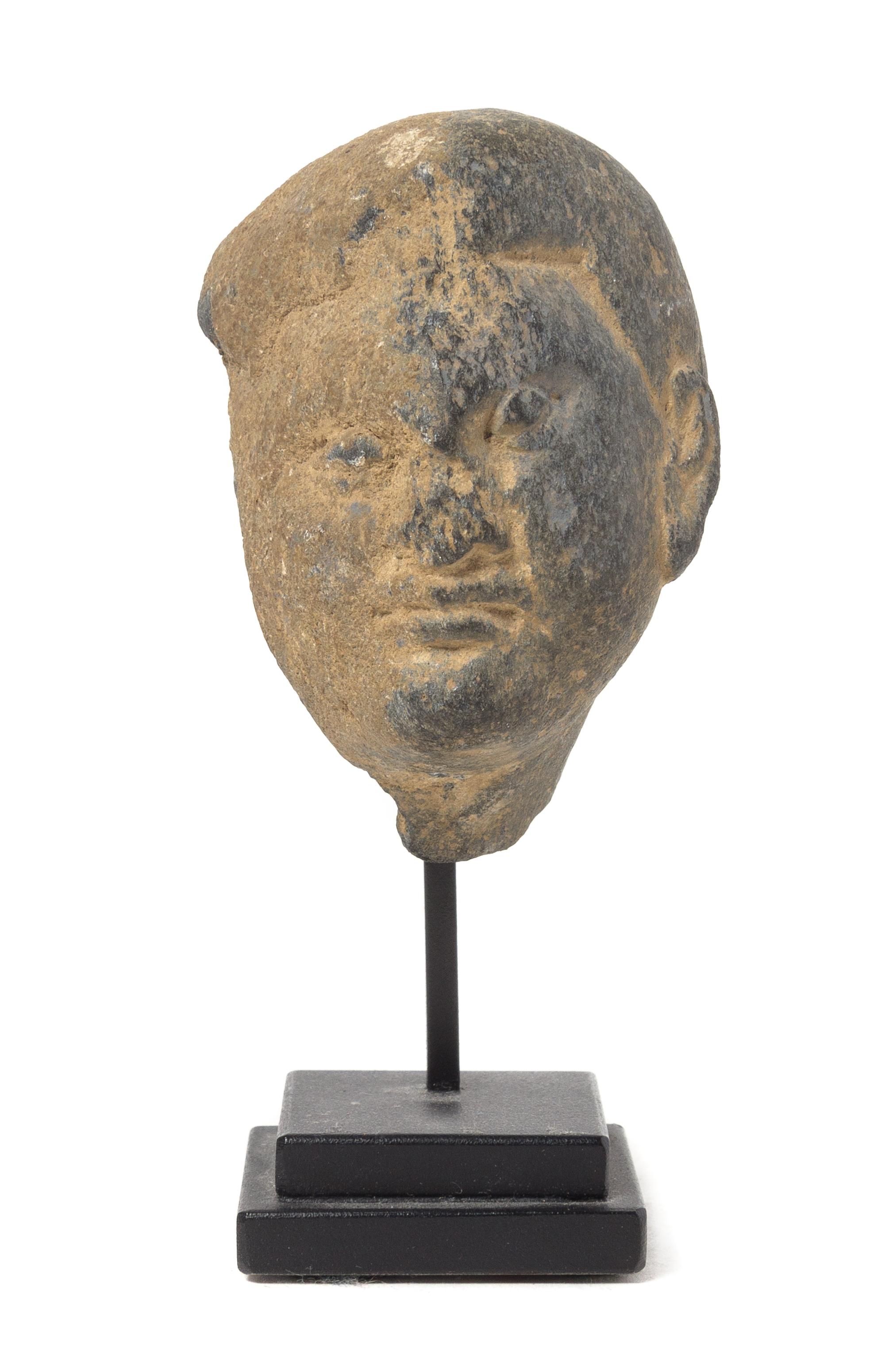 A Gandharan Greystone Head of a Male Height 2 3/4 inches.