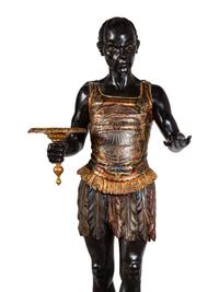 A Venetian Parcel-Gilt and Ebonized Attendant