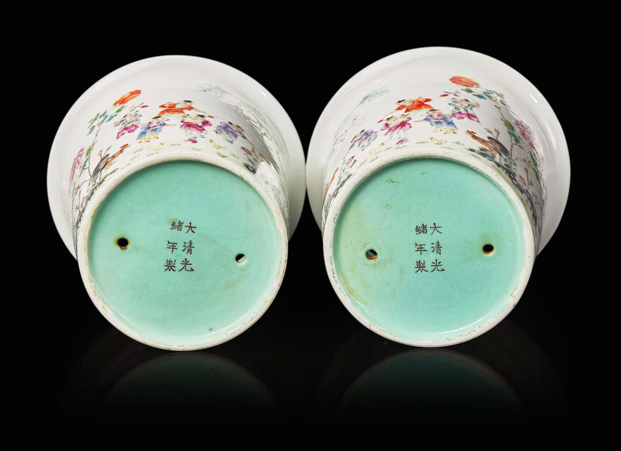 A pair of Chinese famille rose "Boys" jardinieres, six-character Guangxu mark 粉彩嬰戲花盆一對 光緒六字款