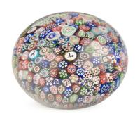 A Baccarat Close Packed Millefiori and Silhouette Glass Paperweight