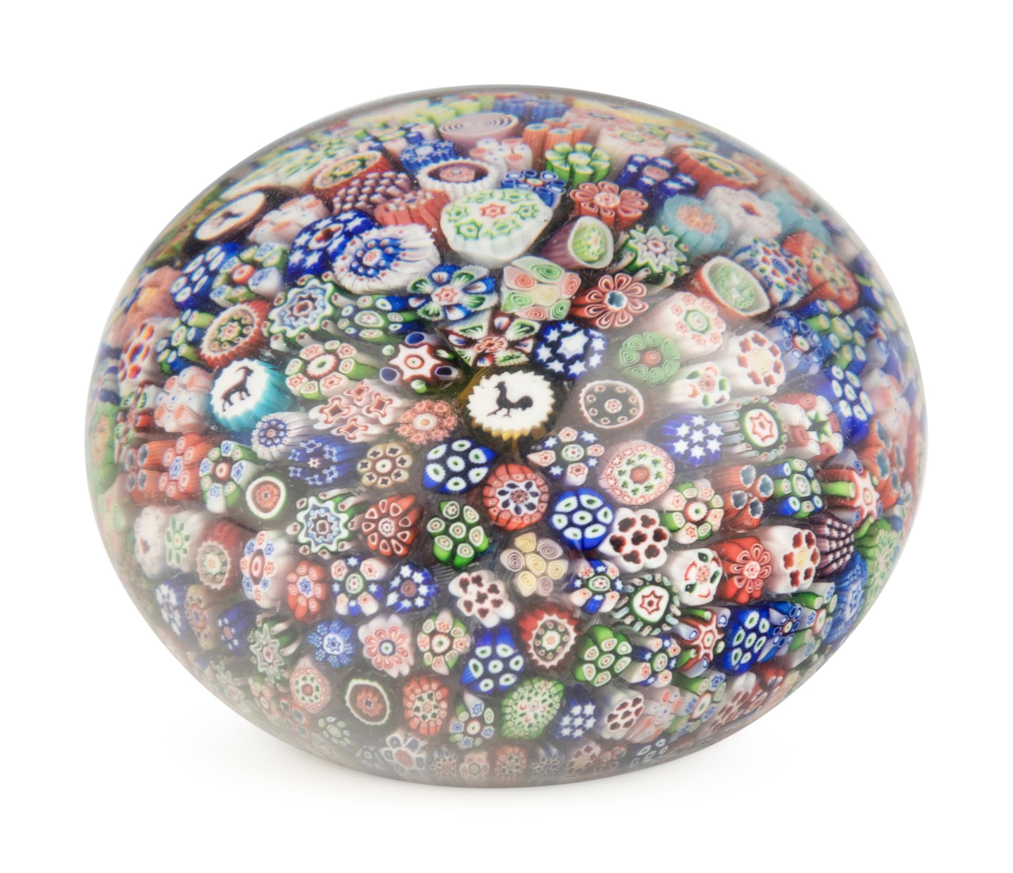 A Baccarat Close Packed Millefiori and Silhouette Glass Paperweight