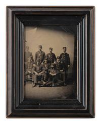 [AFRICAN AMERICANA - EARLY PHOTOGRAPHY]. CDV-sized tintype of a group of men in uniform, incl. African American subject.