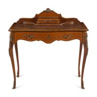 A Louis XV Style Gilt Metal Mounted Writing Desk