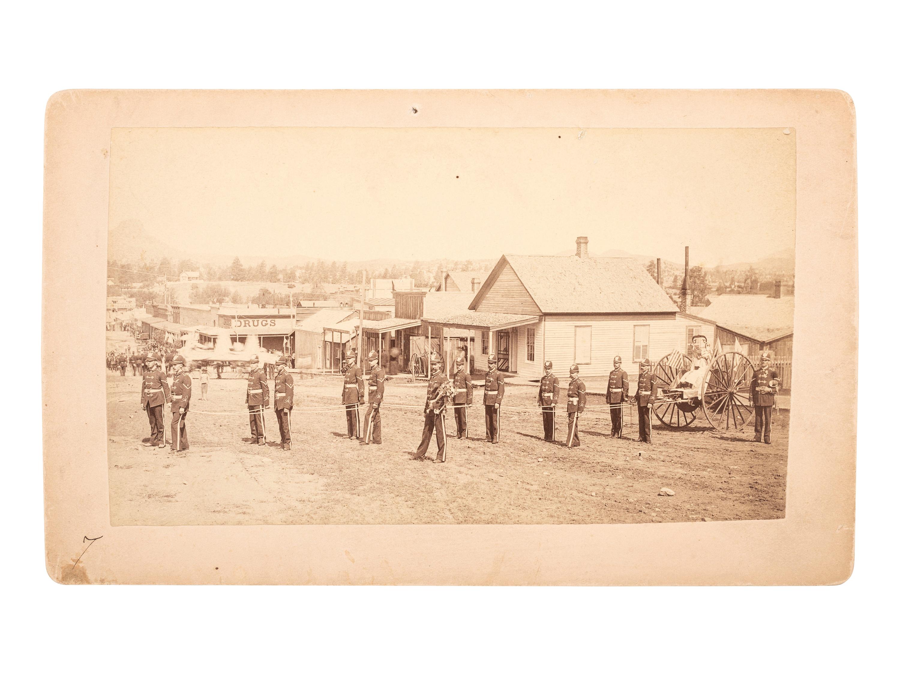 [WESTERN AMERICANA]. JENNINGS, E.M., photographer. Boudoir photograph of a fire team. Prescott, Arizona Territory: 1888-91.