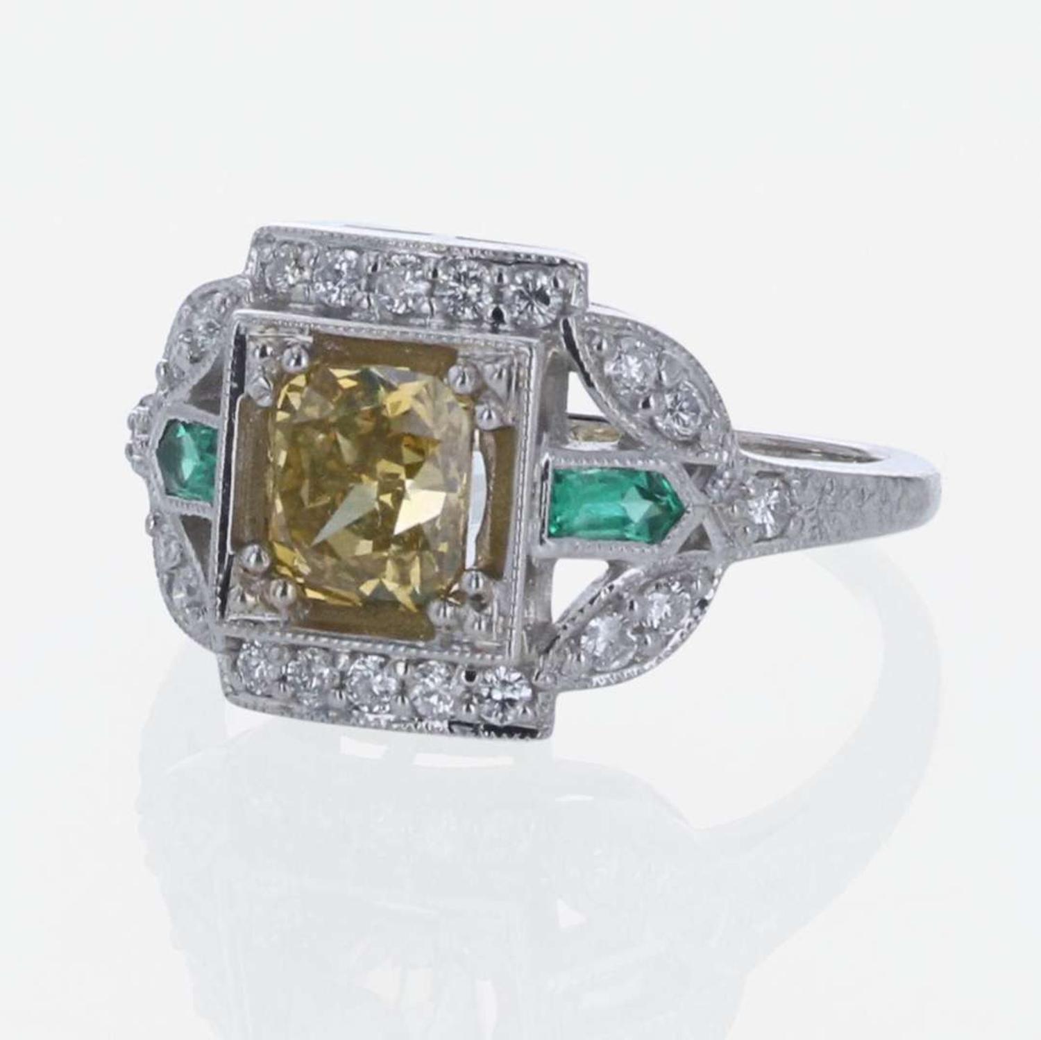 A Colored Diamond, Diamond, Emerald, and 18K White Gold Ring