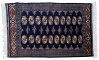 A Bokhara Style Rug 4 feet 1 inch x 2 feet 8 inches.
