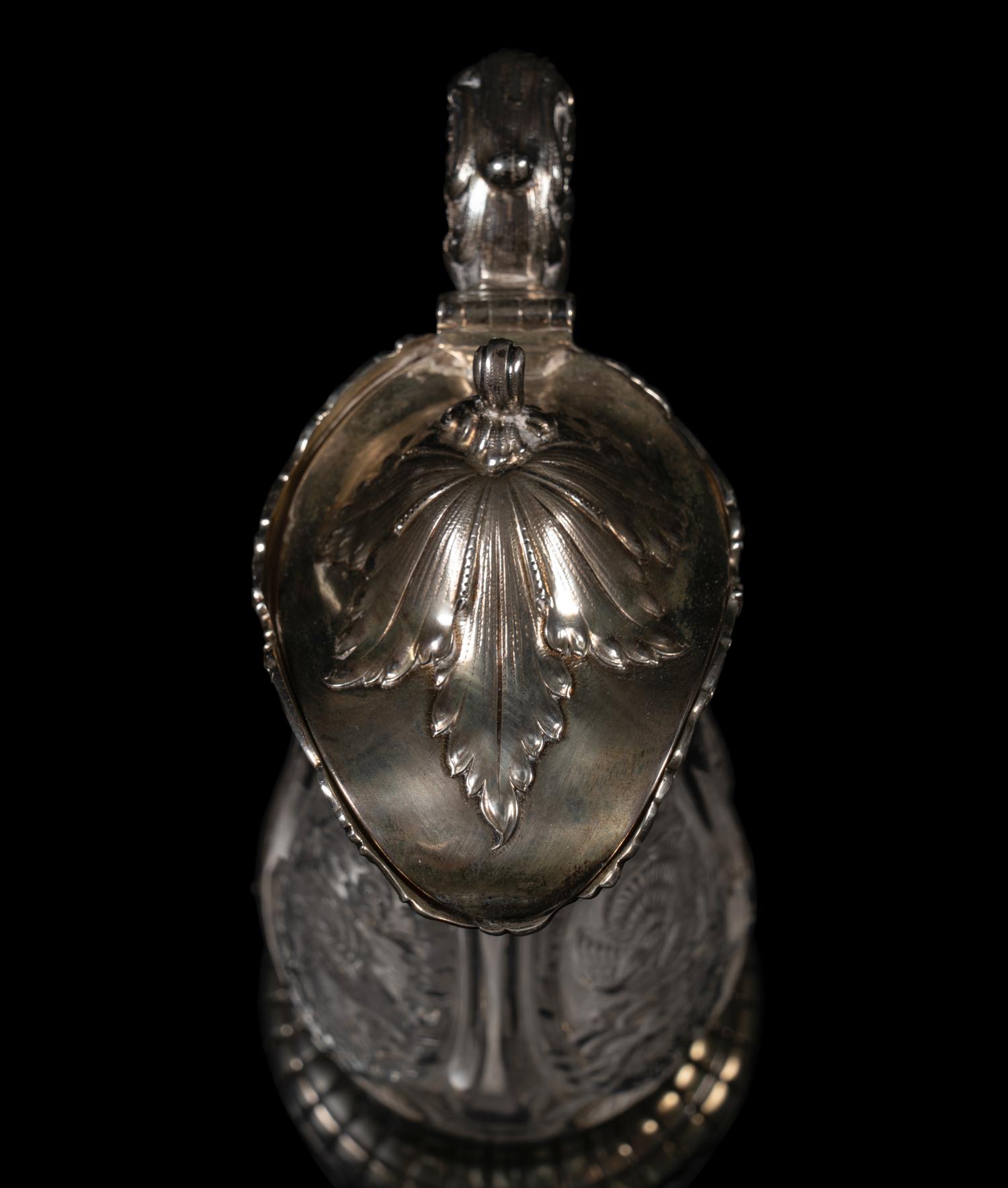 An American Silver Mounted Cut Glass Claret Jug