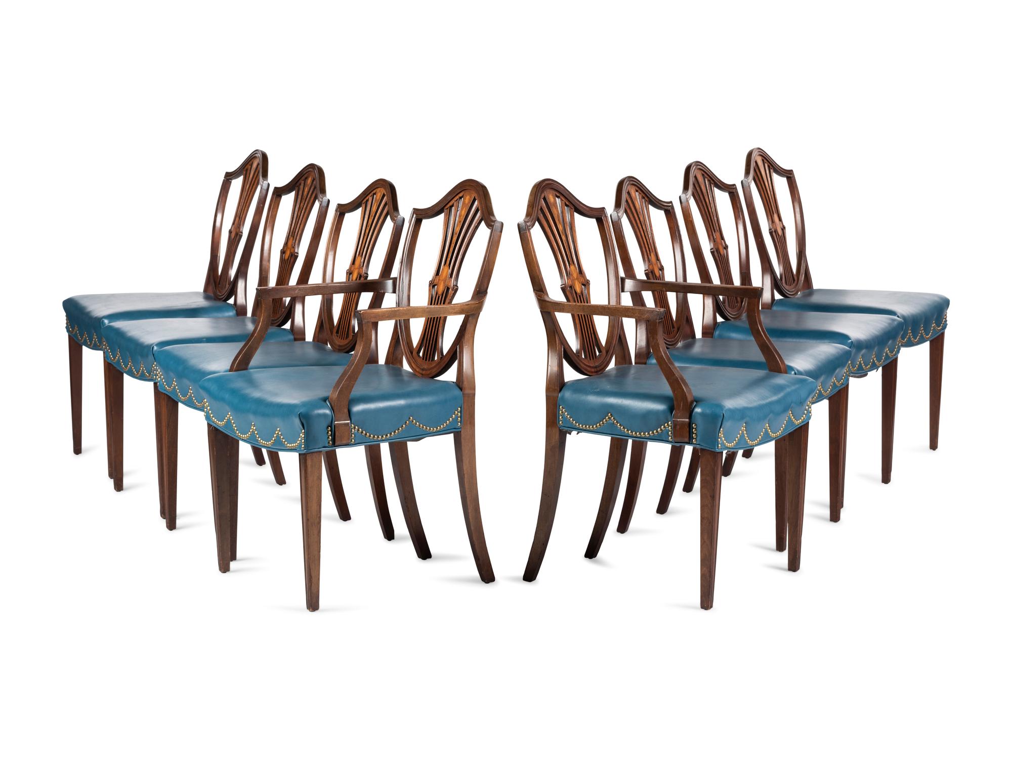 A Set of Eight Federal Style Inlaid and Volute-Carved Mahogany Shield-Back Dining Chairs