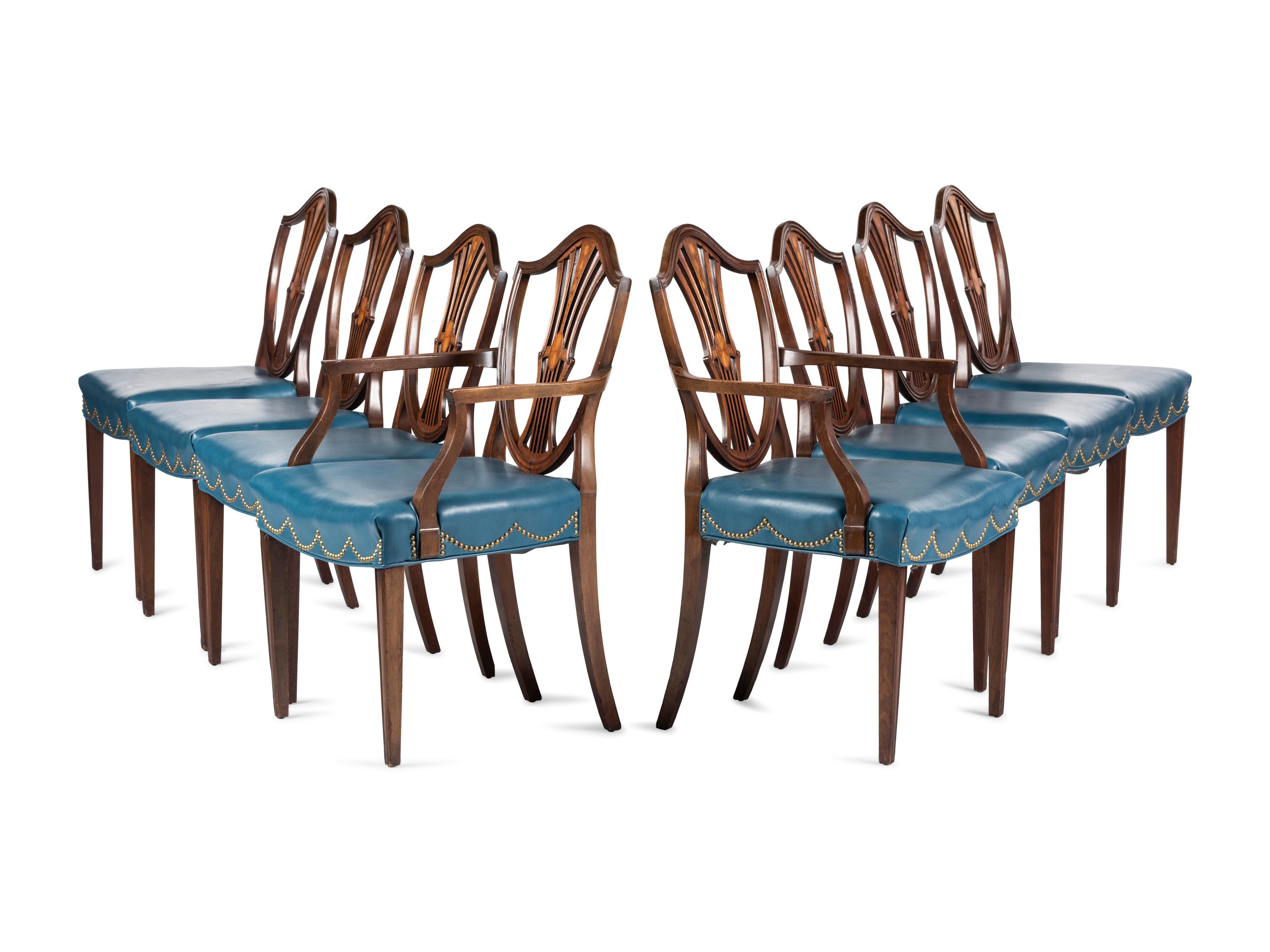 A Set of Eight Federal Style Inlaid and Volute-Carved Mahogany Shield-Back Dining Chairs