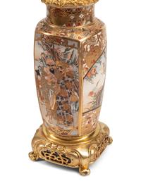 A Pair of Gilt Bronze and Japanese Satsuma Porcelain Candelabra
