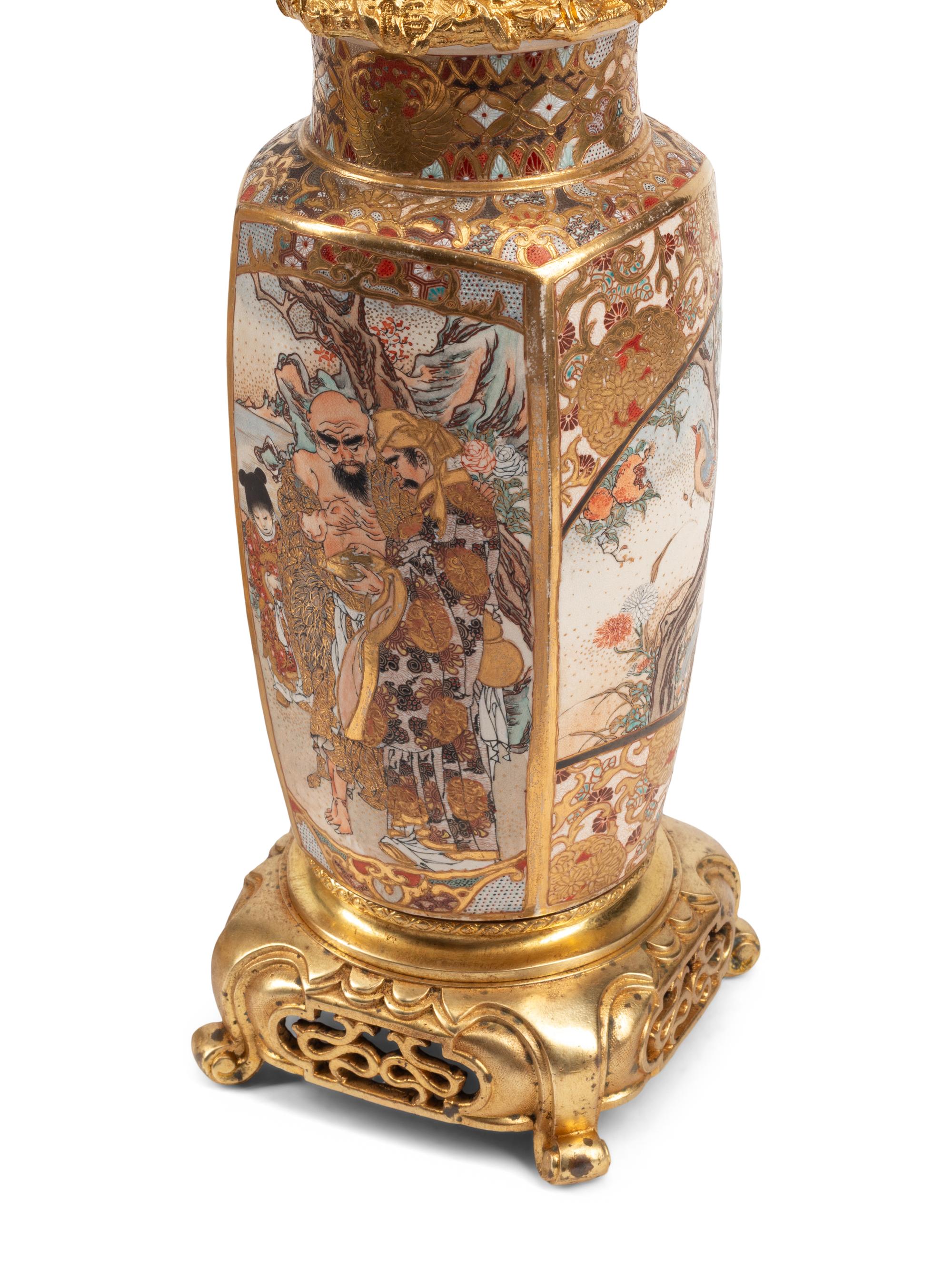 A Pair of Gilt Bronze and Japanese Satsuma Porcelain Candelabra