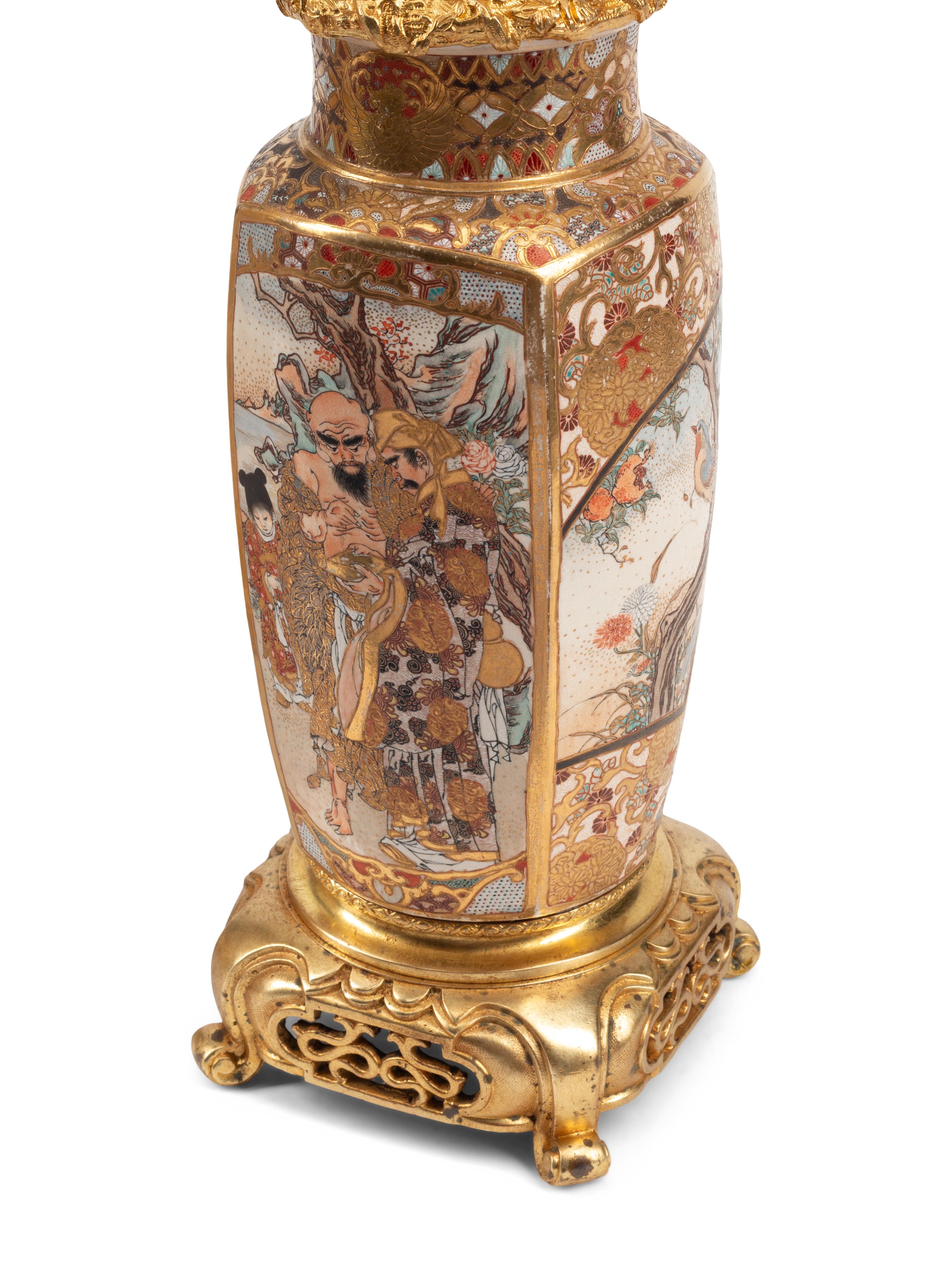 A Pair of Gilt Bronze and Japanese Satsuma Porcelain Candelabra