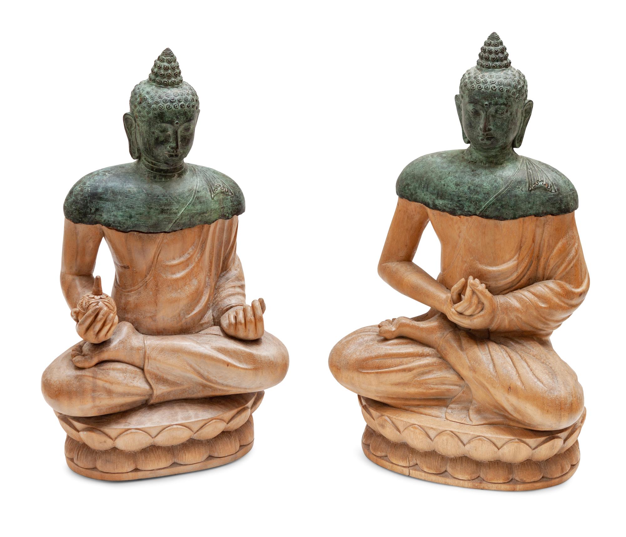 A Pair of Bronze and Carved Wood Seated Buddhas
