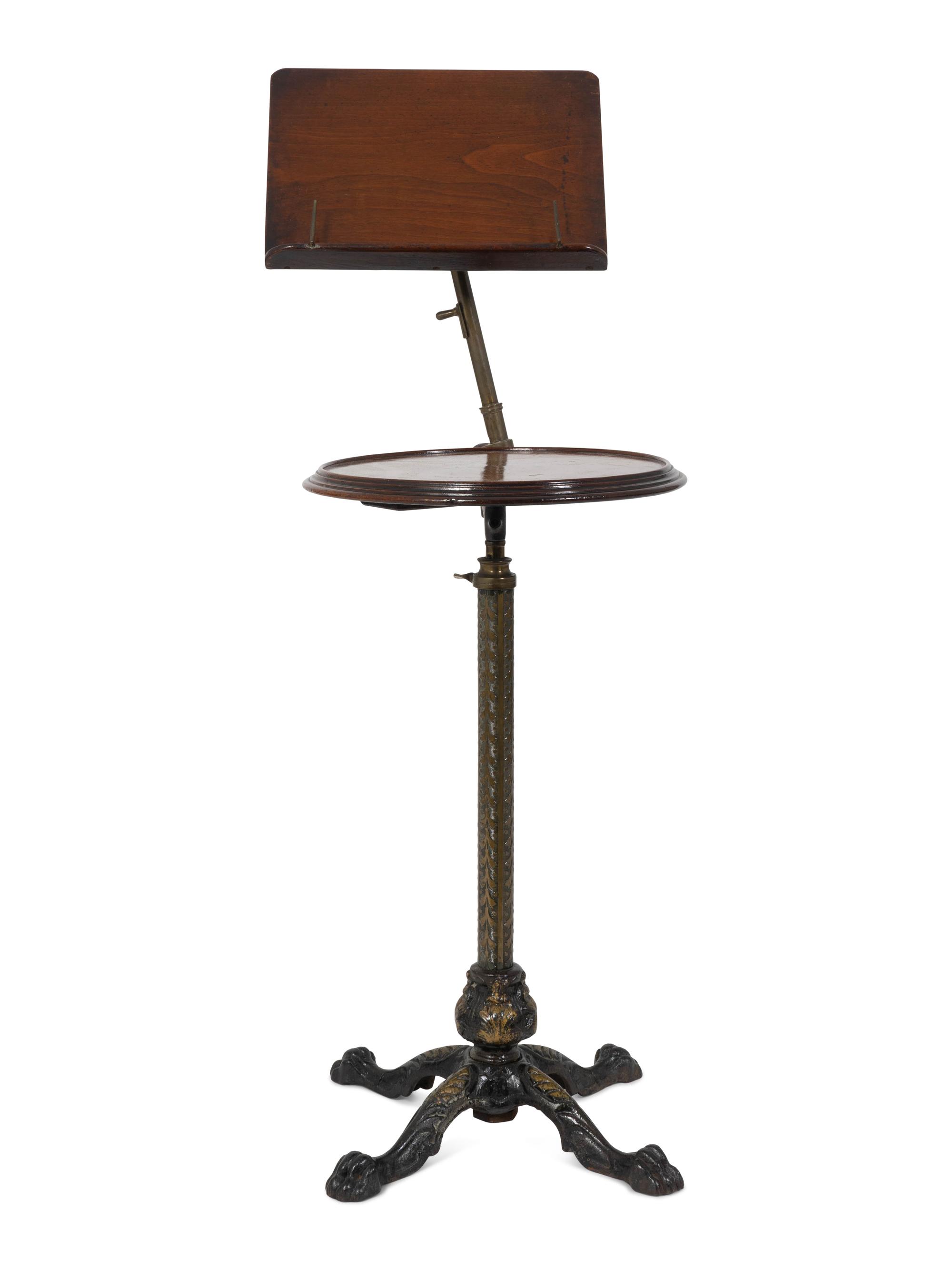 An English Mahogany and Brass Table with Adjustable Book Shelf — 19TH/20TH CENTURY