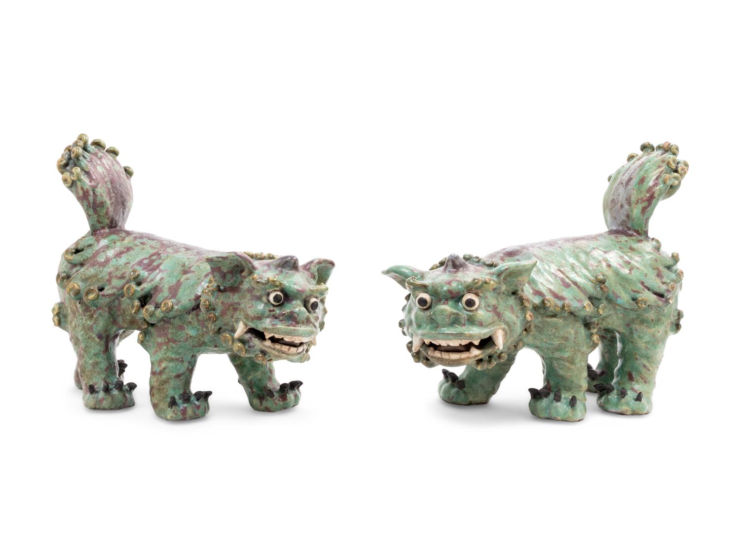 A Pair of Shiwan Red and Green Glazed Stoneware Figures of Fu Lions