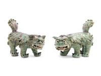 A Pair of Shiwan Red and Green Glazed Stoneware Figures of Fu Lions