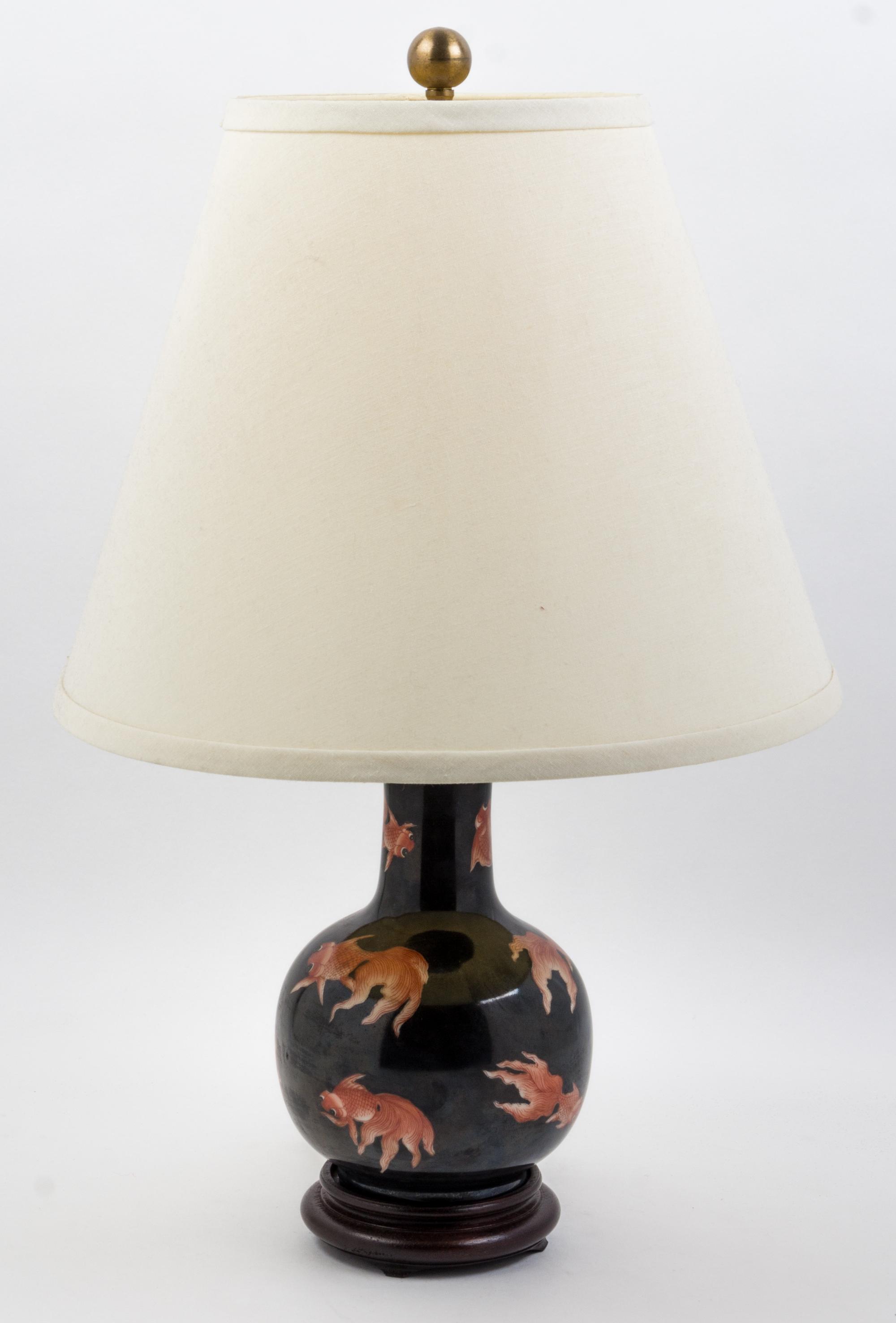 A Chinese Famille Noire Porcelain Vase Height 8 1/2 inches.