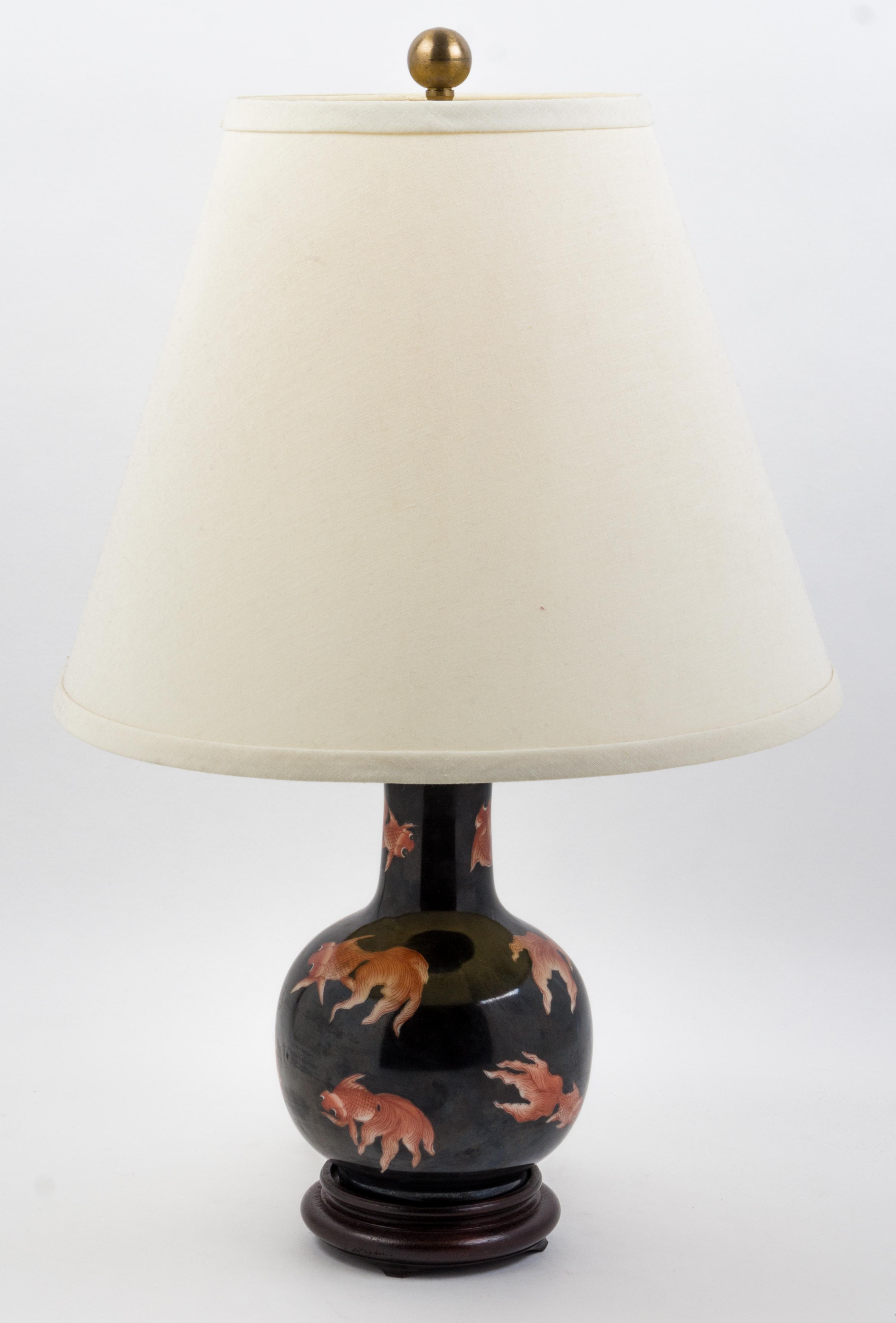A Chinese Famille Noire Porcelain Vase Height 8 1/2 inches.