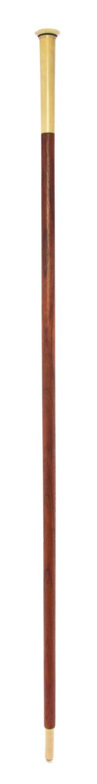 A French Art Deco Ivory Handled Walking Stick, Length of handle 4 1/2 x length overall 36 inches.