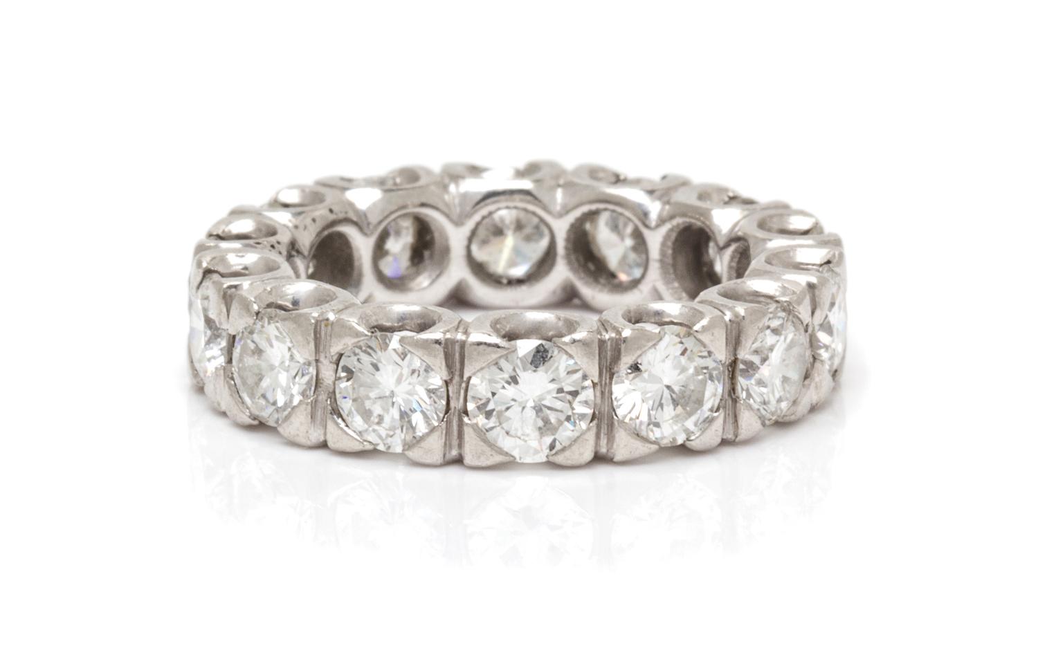 A Platinum and Diamond Eternity Band, 5.50 dwts.