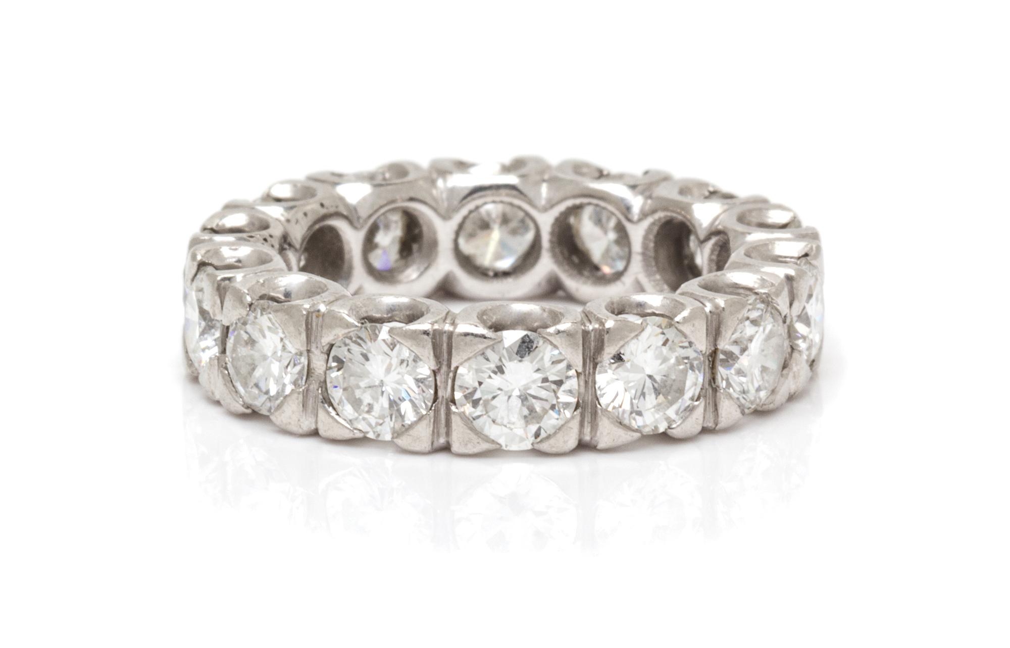 A Platinum and Diamond Eternity Band, 5.50 dwts.