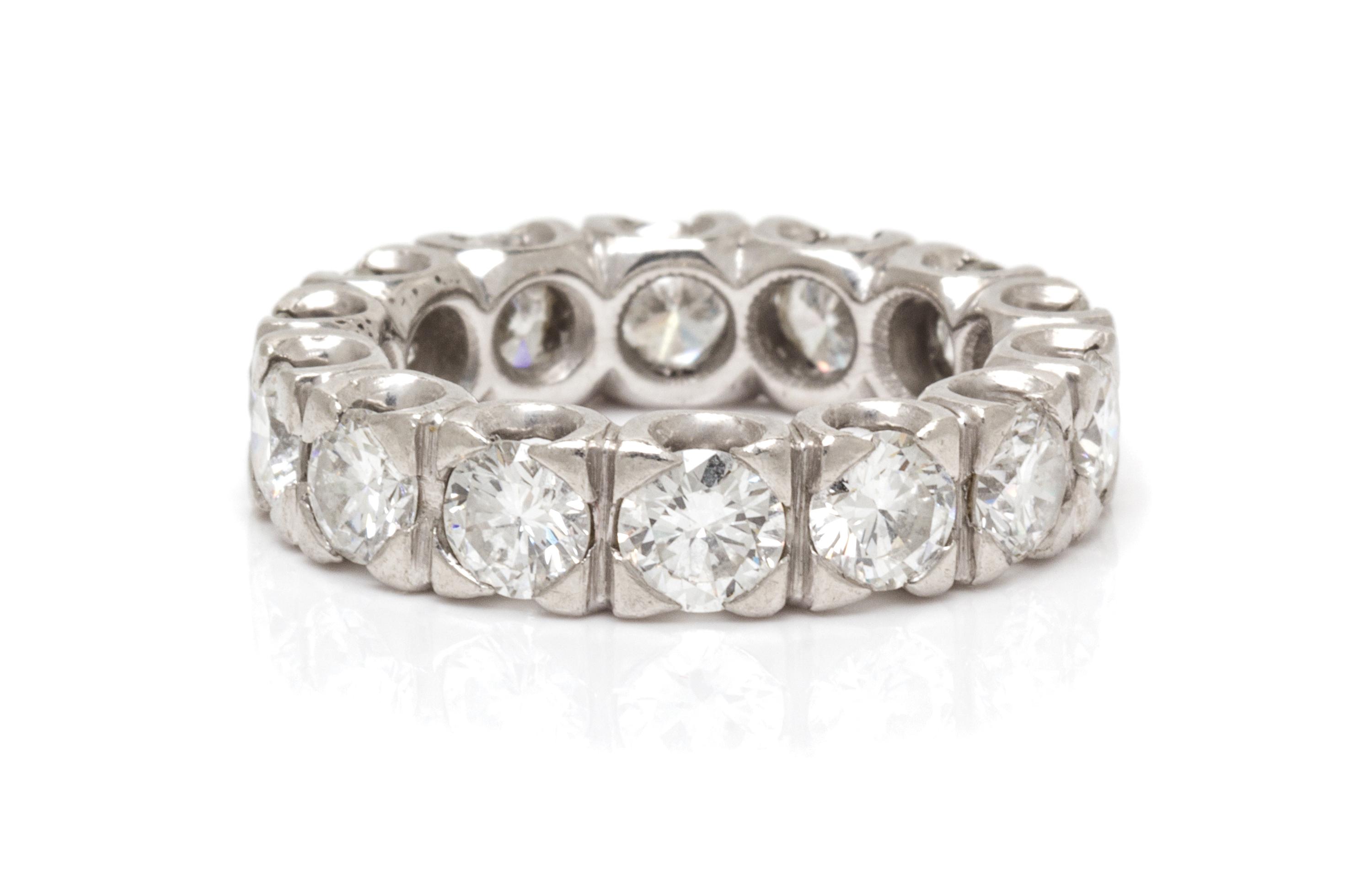A Platinum and Diamond Eternity Band, 5.50 dwts.