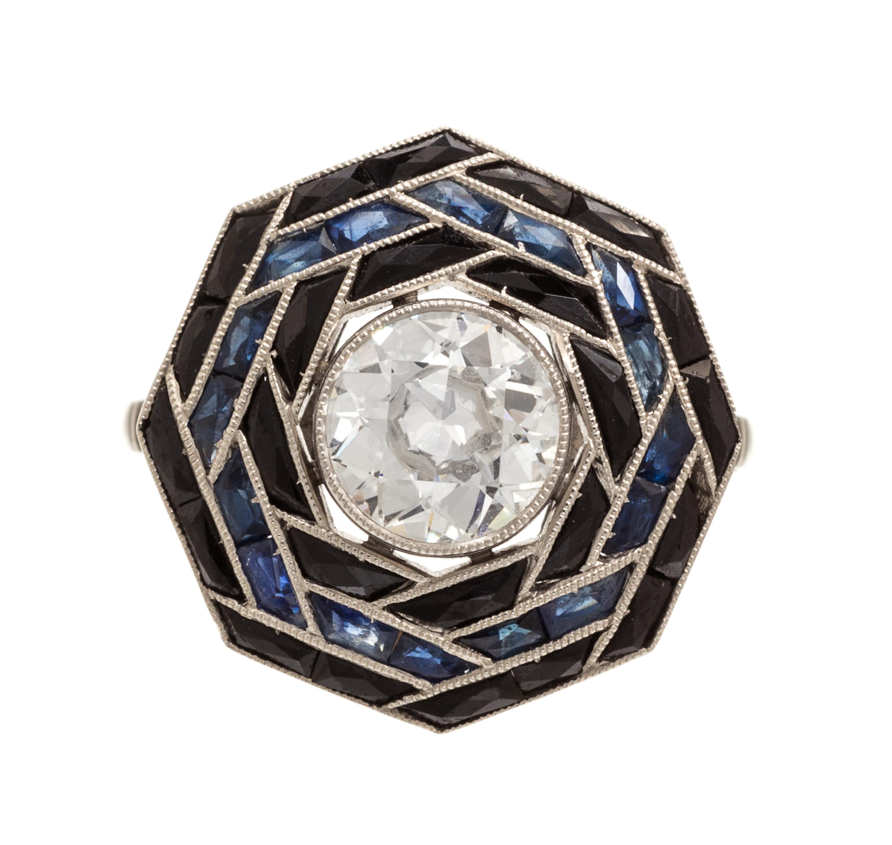 A Platinum, Diamond and Sapphire Ring, 3.90 dwts.