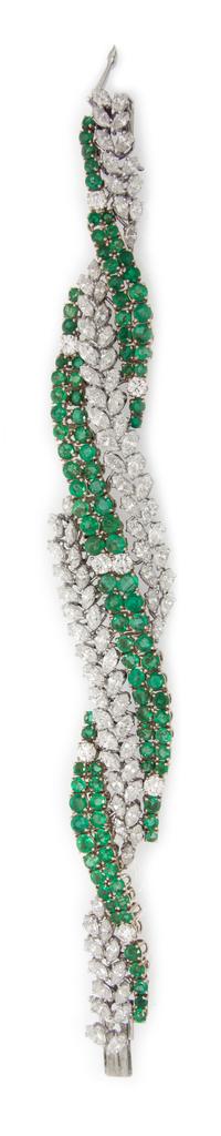 A Platinum, Yellow Gold, Diamond and Emerald Bracelet, 41.10 dwts.