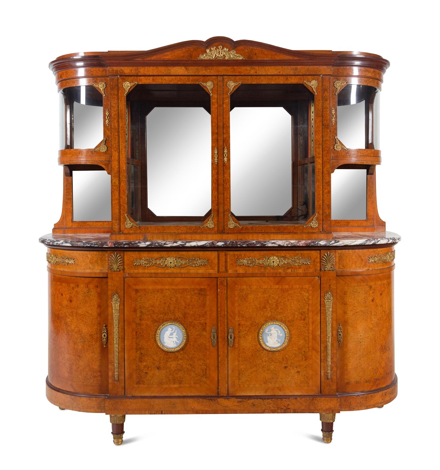 A French Gilt Bronze and Jasperware Mounted Burlwood Dining Suite