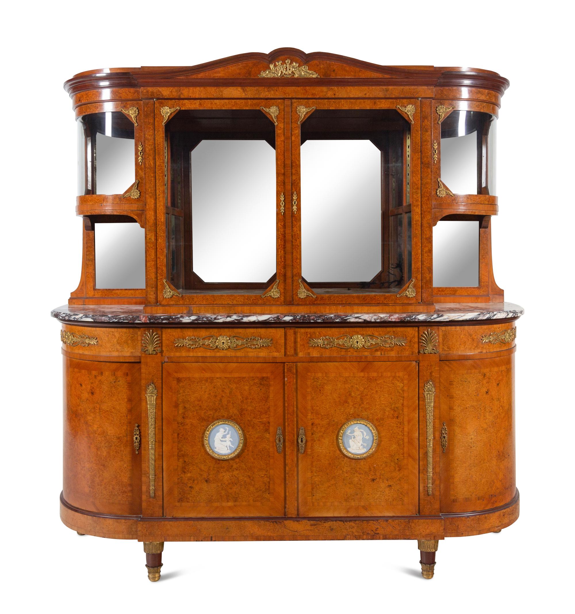 A French Gilt Bronze and Jasperware Mounted Burlwood Dining Suite