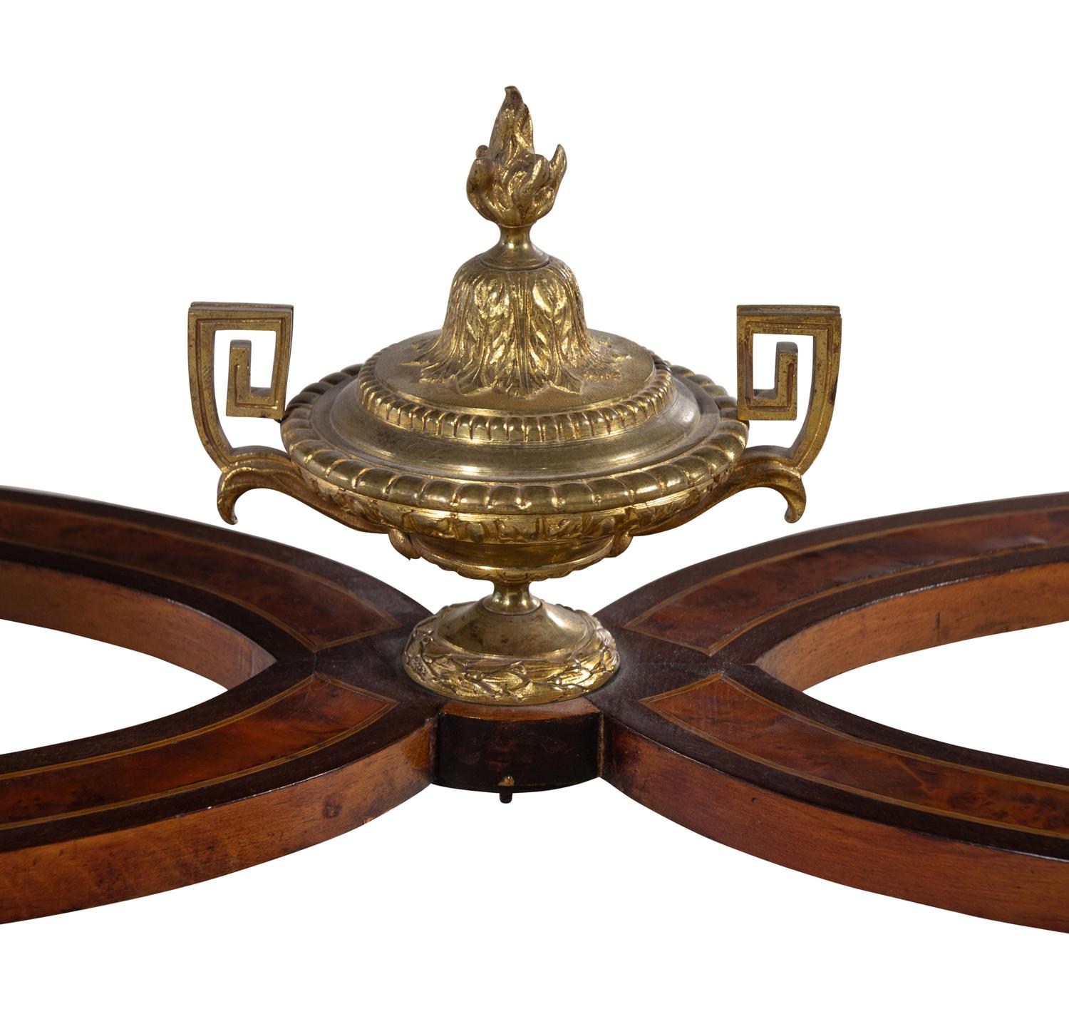A Louis XVI Style Gilt Bronze Mounted Amboyna and Marquetry Center Table