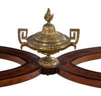A Louis XVI Style Gilt Bronze Mounted Amboyna and Marquetry Center Table