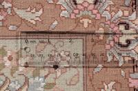 A Tabriz Wool Rug
