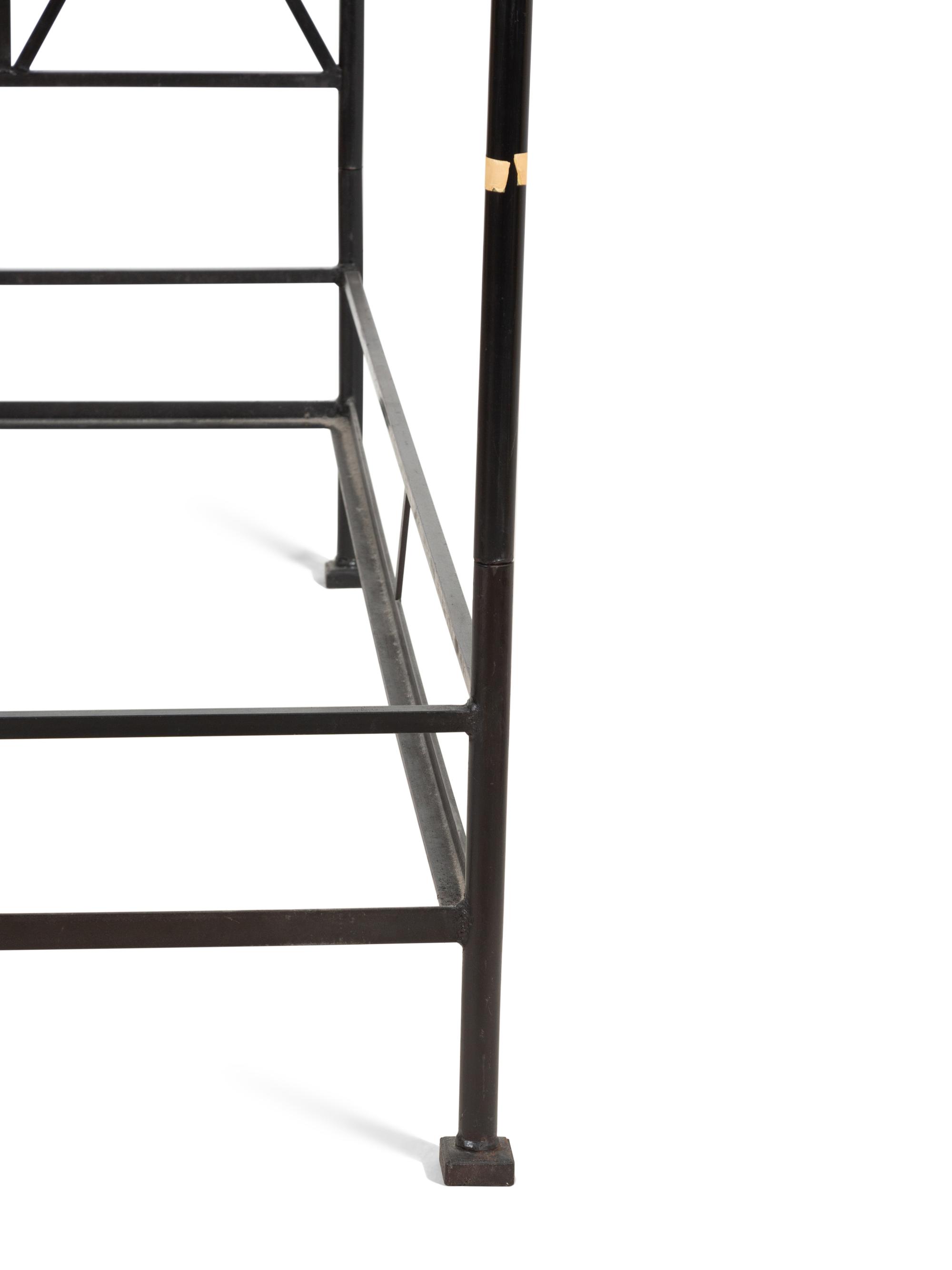 A Pair of Bronzed Metal Twin Four Poster Beds with Bed Hangings