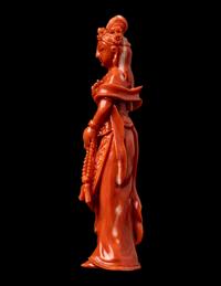 A Small Chinese Red Coral Figure of Guanyin