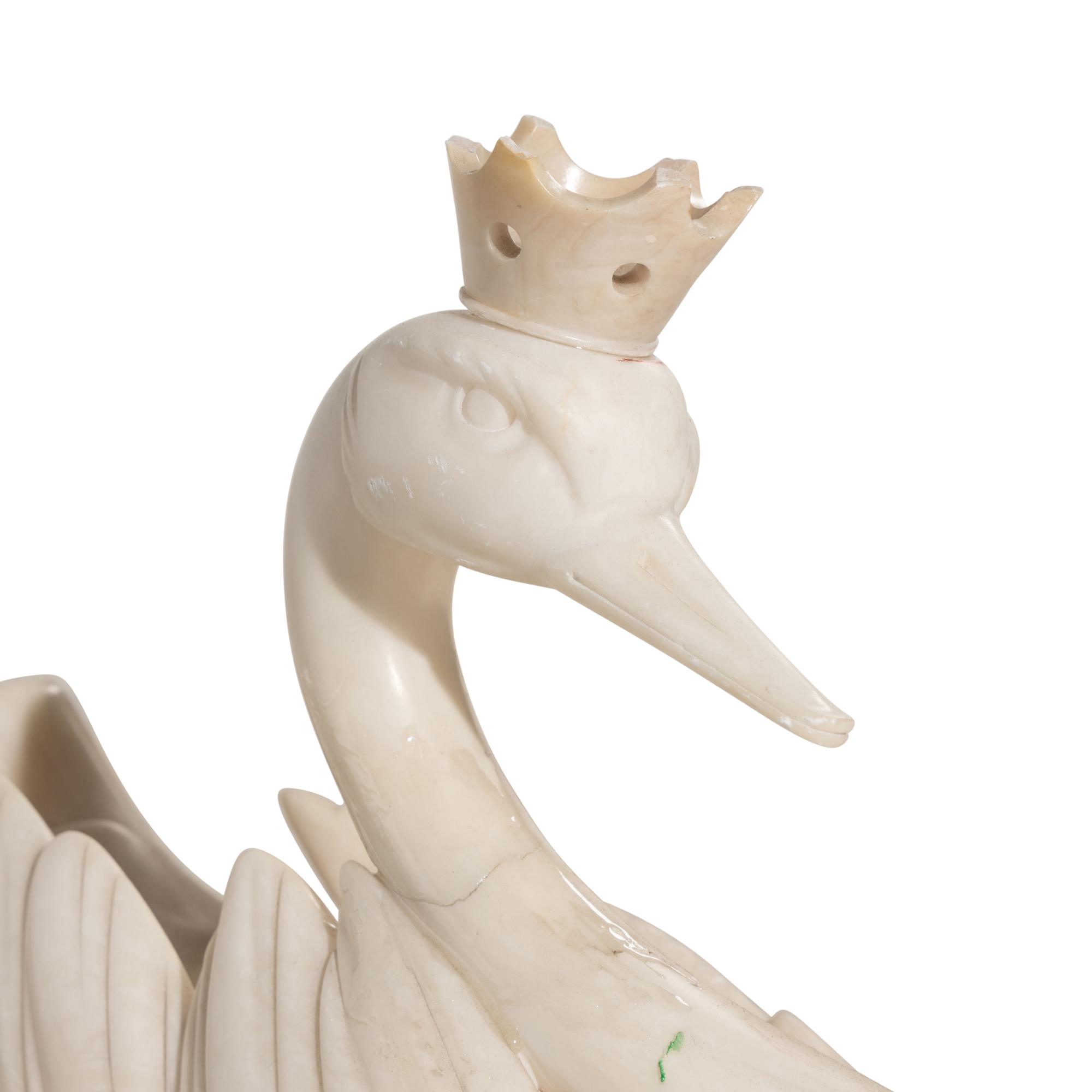 A Carved White Marble Model of a Swan