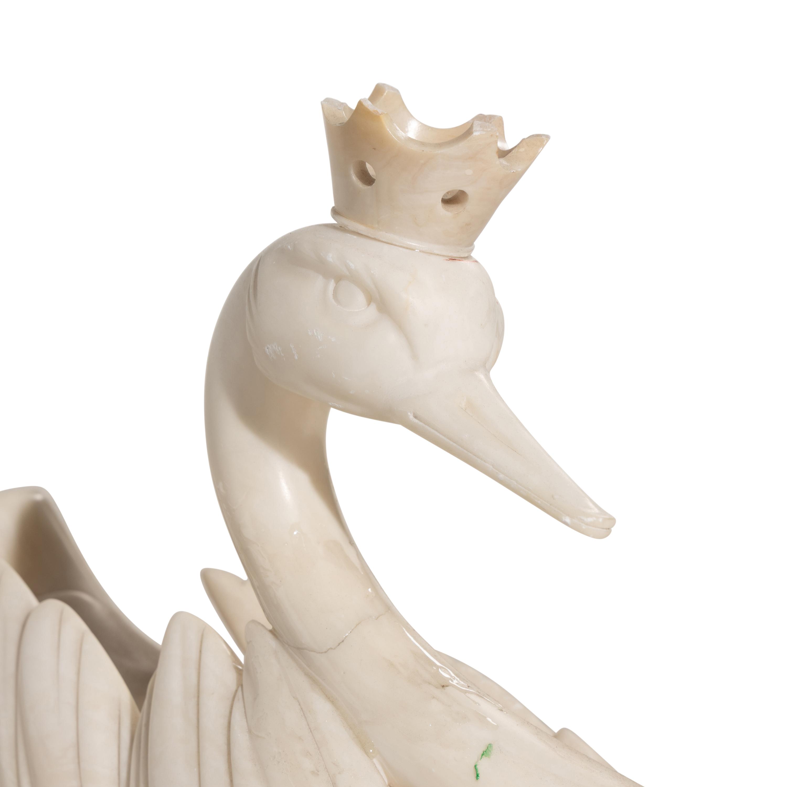 A Carved White Marble Model of a Swan